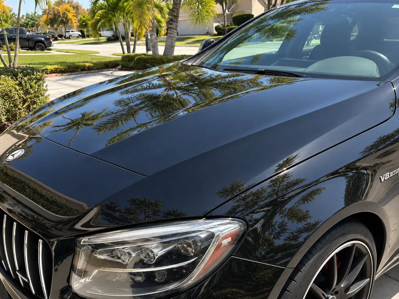 Black Mercedes-AMG hood after, glossy and clean